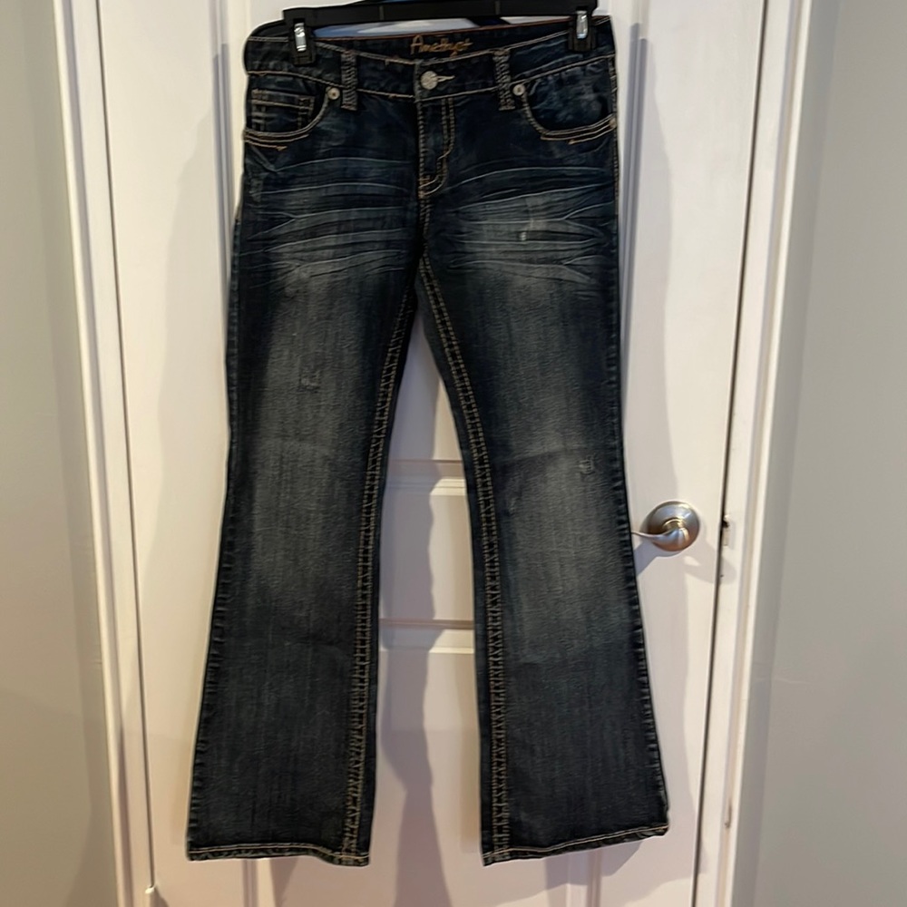 Amethyst distressed flare jeans